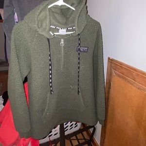 I am selling a Sherpa Victoria’s Secret/Pink pullover, Color Green, Size M.